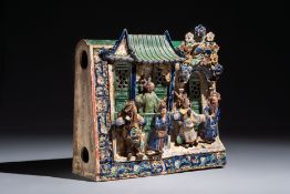 A large and fine Chinese polychrome-glazed Shiwan stoneware group of immortals, 19th C.