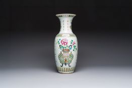 A Chinese famille rose 'Antiquities' vase, signed Zha Bing He Shi, 19th C.