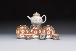 A Chinese famille verte teapot and three famille rose capucine-ground cups and saucers, Kangxi/Qianl