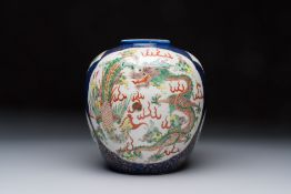 A Chinese famille verte gilt-decorated blue-ground 'Dragon and Phoenix' vase, Kangxi mark, 19th C.