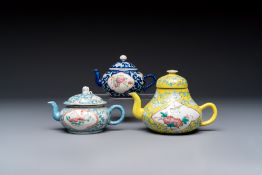 Three Chinese famille rose blue- and yellow-ground teapots and covers for the Straits or Peranakan m