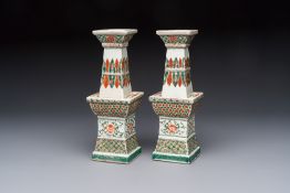 A pair of Chinese famille verte square candle holders, 19th C.