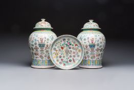 A pair of Chinese famille rose 'Antiquities' covered vases and a dish, 19th C.