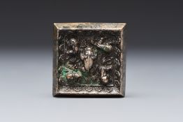A small Chinese metal-alloy square mirror with relief design, Tang