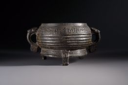 A Chinese archaic ritual tripod food vessel with Taotie design, 'Gui', Western Zhou