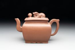 A Chinese Yixing stoneware 'lion and brocade ball' teapot and cover, 19/20th C.