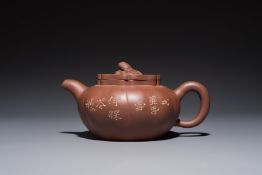 A Chinese Yixing stoneware inscribed teapot and cover, Zhong Shi Qiu mark, 20th C.