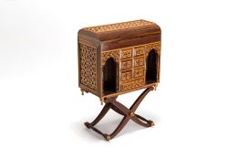 A Moorish-style wooden chest on stand with mirrors and geometric patterns, 20th C.