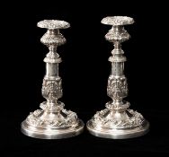 PAIR GEORGE IV SILVER ARMORIAL TELESCOPIC CANDLESTICKS, cast floral panels inset within plain