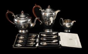 FOUR-PIECE SILVER TEA SERVICE, Barker Bros. Ltd., Birmingham 1948, narrow panelled form with