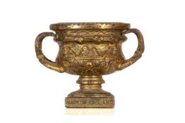 WARWICK VASE GILT BRASS CAR MASCOT, on titled base, 6cms (h) Provenance: private collection