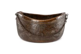 CARVED WOOD DEEP BOWL, probably a kashkul or beggar's bowl, of navette form with flat base, attached