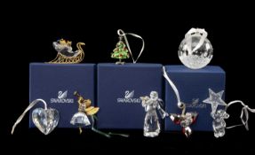 EIGHT SWAROVSKI CRYSTAL HANGING CHRISTMAS ORNAMENTS, Angel, 1054562, Kris Bear, 945580, Angel,