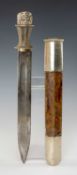 HIMALAYAN DAGGER, Bhutan or Tibet, white metal openwork domed pommel, waisted ray skin grip, white