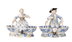PAIR MEISSEN PORCELAIN FIGURAL BASKET SALTS, blue and white with gilt highlights, impressed and