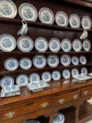 18TH CENTURY WELSH OAK HIGH DRESSER & POTTERY, cornice with reeded moulding, three plate racks, wide