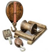 THREE BLOCK & TACKLE PULLEYS, wood and wrought iron, 53cms (l) the largest; and an antique oak