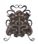ARTS & CRAFTS PERIOD HAMMERED COPPER & WROUGHT IRON FIRE SCREEN, decorated with stylised tulips,