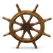 VINTAGE WOODEN EIGHT-SPOKE SHIP'S WHEEL, with brass band and steel hub, 88cms (diam.) Provenance: