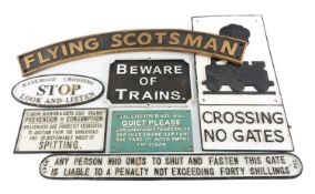 RAILWAY SIGNAGE comprising reproduction cast iron Flying Scotsman nameplate, 90cms (l), and a