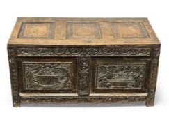 18TH CENTURY OAK COFFER, with two-panelled carved front and three fielded panelled lid, 48 (h) x