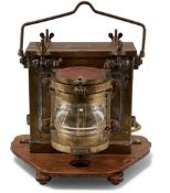 VINTAGE PLAYMIT BRASS-CASED SHIP'S MASTHEAD LAMP, marked 'Steaming AP. 17250', on a later wooden