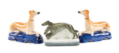 PAIR OF VICTORIAN STAFFORDSHIRE GREYHOUND INKWELLS, 17.5cms (h); Rye Pottery model of chasing
