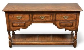 QUALITY REPRODUCTION OAK DRESSER BASE, in the manner of Titchmarsh and Goodwin with five drawers,