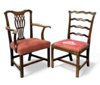 TWO ANTIQUE MAHOGANY CHAIRS, elbow chair with pierced splat back, and another similarly coloured
