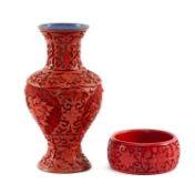 CHINESE CINNABAR LACQUER VASE, 15.5cms (h); and bangle, 7.5cms (diam.) (2) Provenance: private