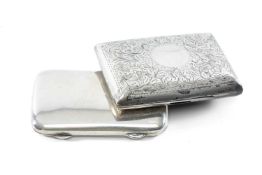 TWO SILVER CIGARETTE CASES, Edward VII rectangular with scroll engraved decoration and vacant