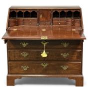 GOOD 20TH CENTURY MAHOGANY FOUR-DRAWER BUREAU with drop-down front and fine fitted interior, brass