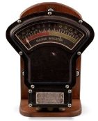 SIEMENS BLACK ALUMINIUM-CASED SHIP'S RUDDER INDICATOR, 33 (h) x 29cms (w), mounted on a wooden stand