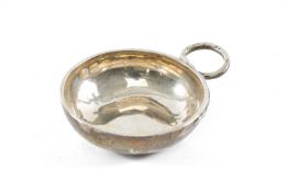 FRENCH 19TH CENTURY WHITE METAL TASTEVIN, snake design loop handle, engraved to the rim 'J.