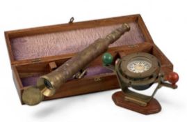 REPRODUCTION BRASS CASED TELESCOPE, 44cms (h), and a brass cased nautical compass on gimble stand