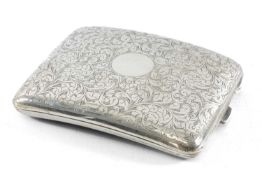 GEORGE VI CIGARETTE CASE of curved rectangular form, chased with scrolls, vacant cartouche,