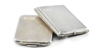 TWO RECTANGULAR SILVER MATCHBOOK HOLDERS, with engine turned decoration, Birmingham 1928, 6 x 4.