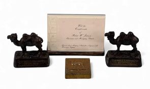 CAMMELL LAIRD & CO. TWO METAL PAPERWEIGHTS, cast as camels with brass plaques, Cammell Laird & Co.