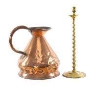 LARGE 19TH CENTURY COPPER THREE GALLON HARVEST JUG, 35cms (h); and a tall brass candle holder with