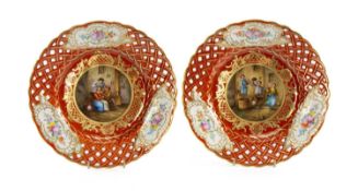 PAIR OF DRESDEN CABINET PLATES, having three panels painted with floral sprays, centres painted with