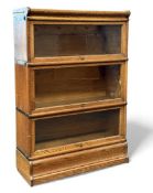 GLOBE WERNICKE STYLE OAK SECTIONAL BOOKCASE, 127 (h) x 81 (w) x 32cms (d) Provenance: private