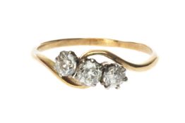 DIAMOND THREE-STONE RING, old round cut diamonds totalling approx. 0.5cts, cross-over setting, in