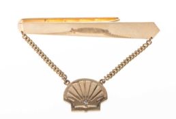 SHELL LONG SERVICE 9CT GOLD & DIAMOND TIE CLIP, 60mms, 10.7g Provenance: private collection