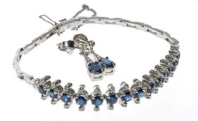 18CT WHITE GOLD SAPPHIRE & DIAMOND BRACELET, set with round cut sapphires flanked with tiny