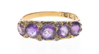 18CT GOLD FIVE-STONE AMETHYST RING, with diamond chip accents, 3.7g, size Q Provenance: deceased