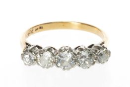 18CT GOLD & PLATINUM FIVE-STONE DIAMOND RING, the five graduated old-cut stones in claw setting,