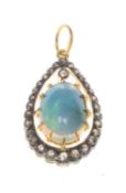 SILVER GILT SYNTHETIC OPAL & DIAMOND CHIP PENDANT, stamped '925', the loop stamped '585', 1.8g