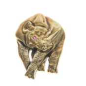 14CT GOLD NOVELTY RHINO BROOCH PENDANT, matt and polished surface, set with ruby eye, pin and loop