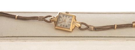 TISSOT 18CT GOLD LADIES' BRACELET WATCH, 1950s, square dial with fancy lugs and integral 9ct mesh