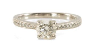 DIAMOND & PLATINUM SOLITAIRE RING, round brilliant-cut diamond 0.7ct, above channel set diamond